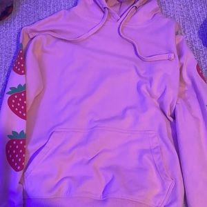 I am selling a strawberry hoodie, it is in perfect condition and it fits great!